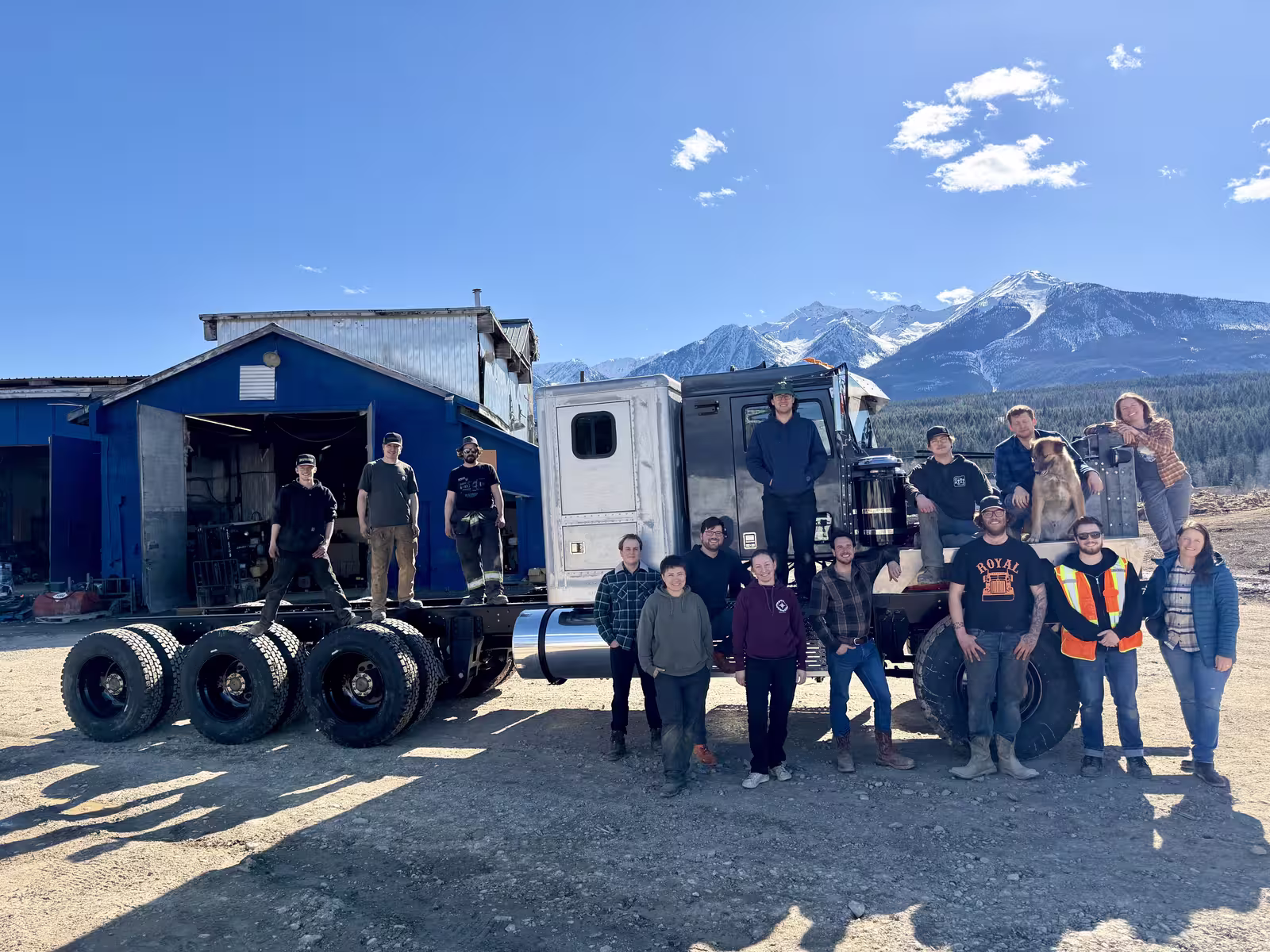 The Edison Motors crew with the Royal Oilfield BDE outside the shop